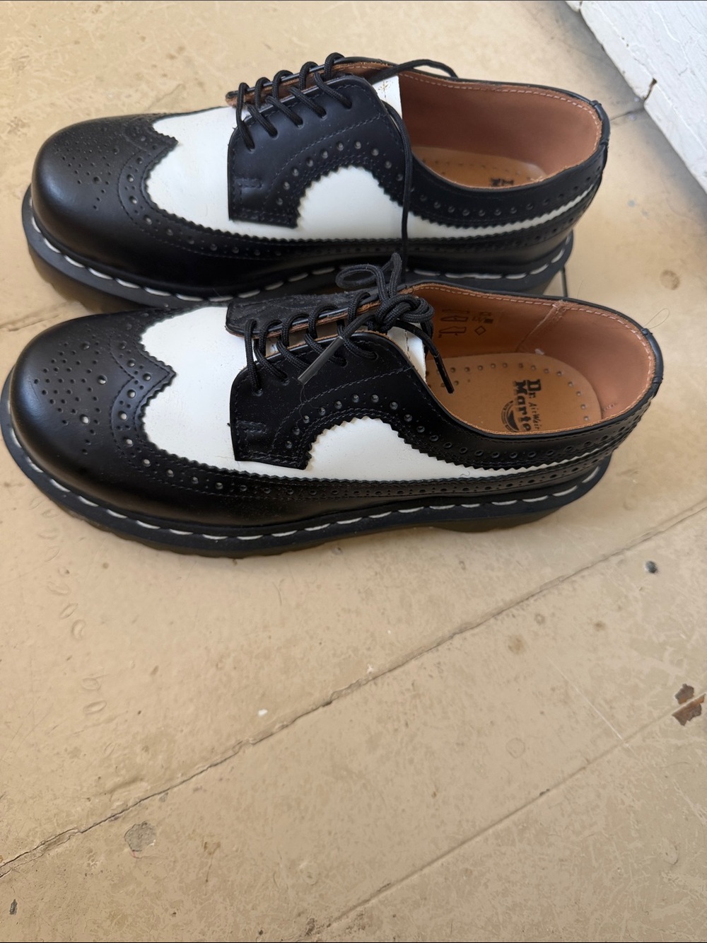 Dr. Martens Black and White Wingtip Brogue Oxfords